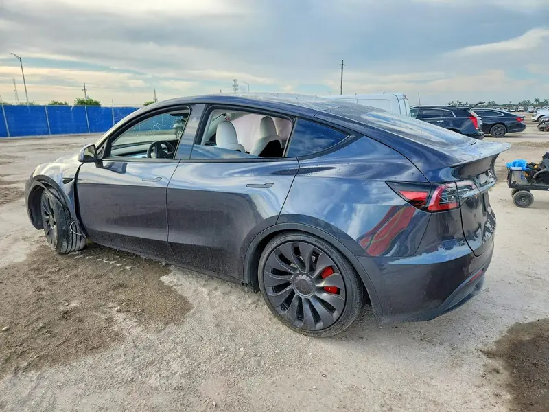 2025 Tesla Model Y, VIN 7SAYGDEF8SA375318, photo 2 of 13